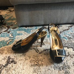 Glam Michael Kors black and gold heels